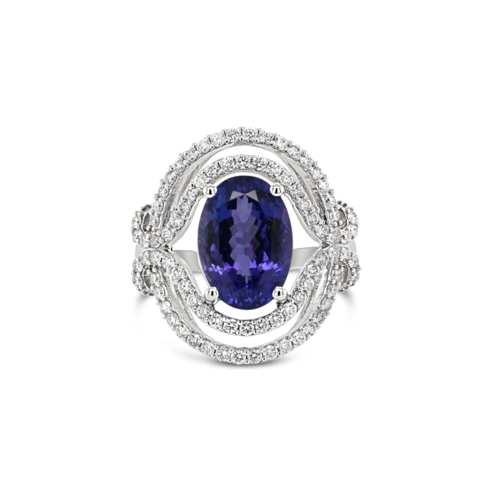 Elegant Curved Tanzanite and Diamond Ring in White Gold