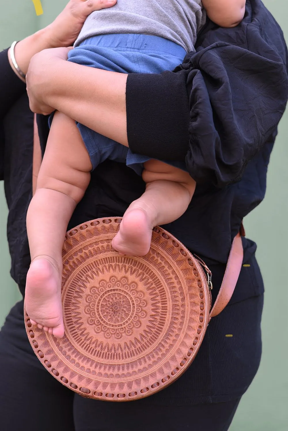 Embossed Circle Crossbody