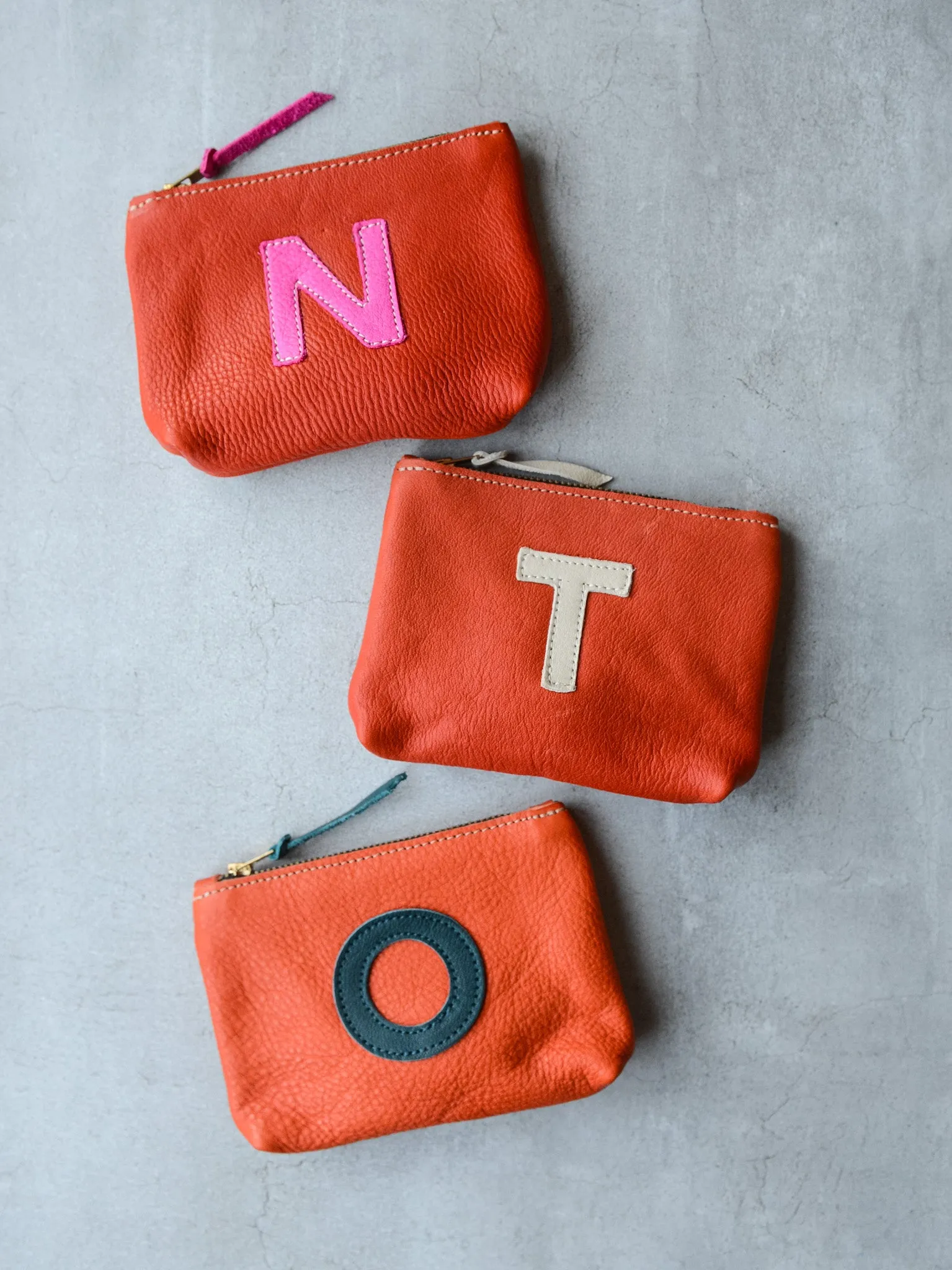 SMALL INITIAL POUCH - TOMATO RED