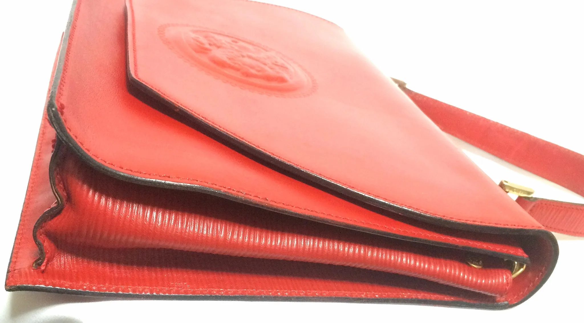 Vintage FENDI genuine red leather classic handbag with iconic Janus medallion embossed motif at front. 050628ya1