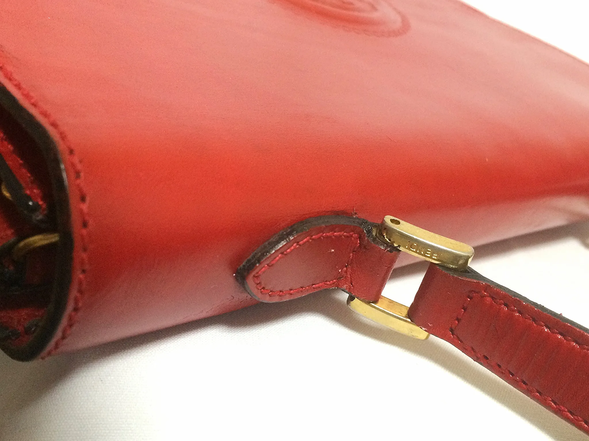 Vintage FENDI genuine red leather classic handbag with iconic Janus medallion embossed motif at front. 050628ya1