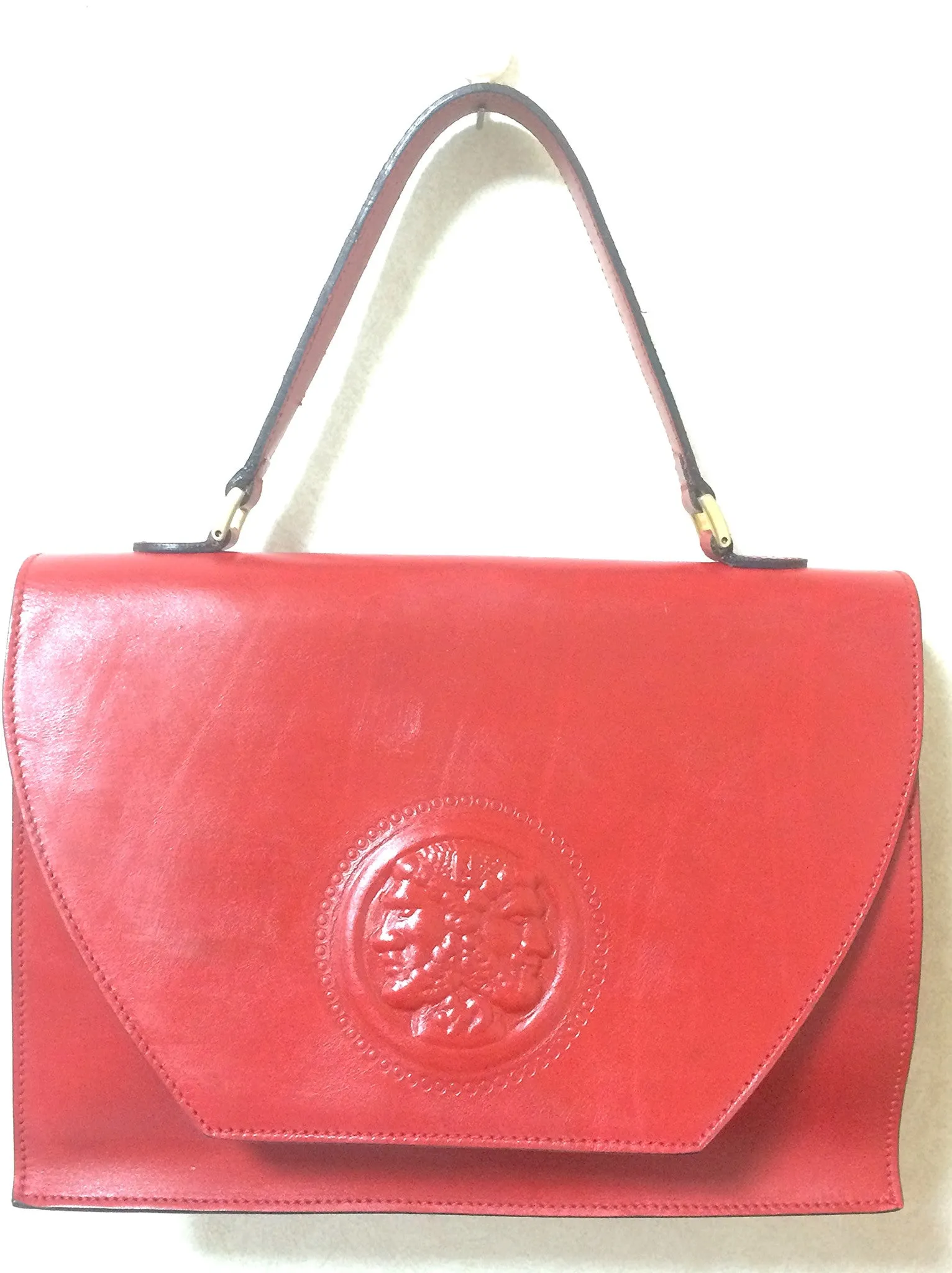 Vintage FENDI genuine red leather classic handbag with iconic Janus medallion embossed motif at front. 050628ya1