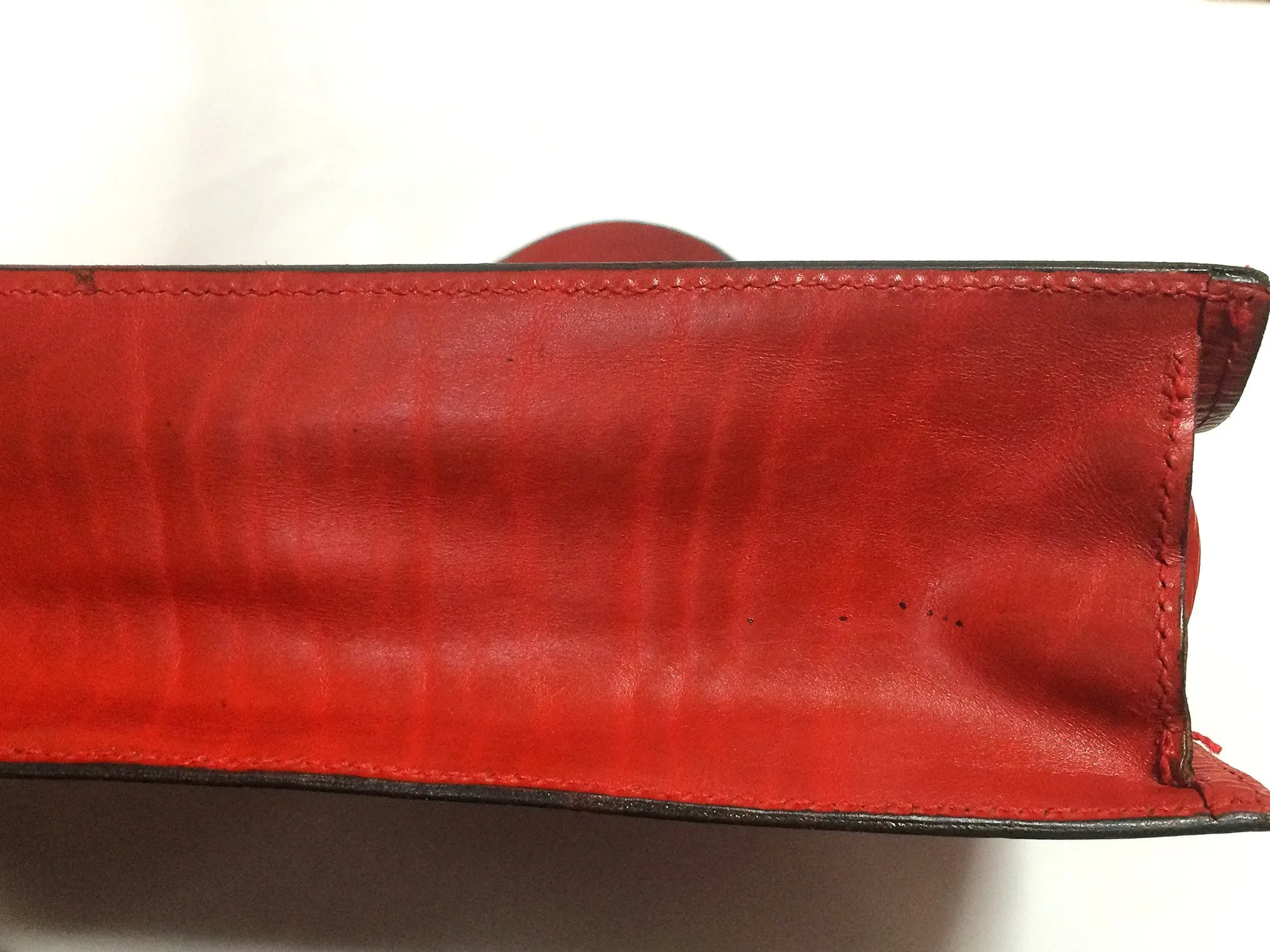 Vintage FENDI genuine red leather classic handbag with iconic Janus medallion embossed motif at front. 050628ya1