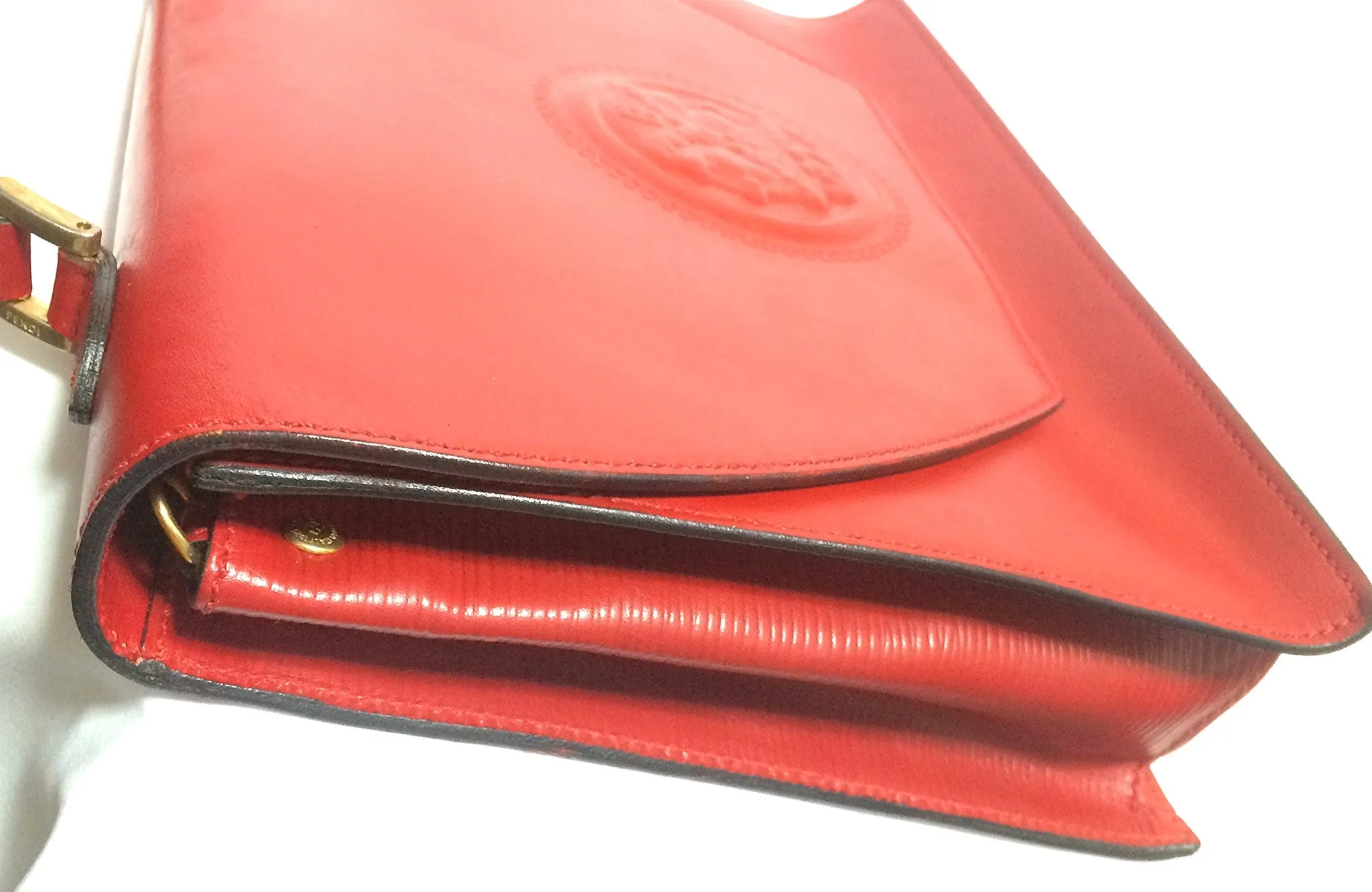 Vintage FENDI genuine red leather classic handbag with iconic Janus medallion embossed motif at front. 050628ya1