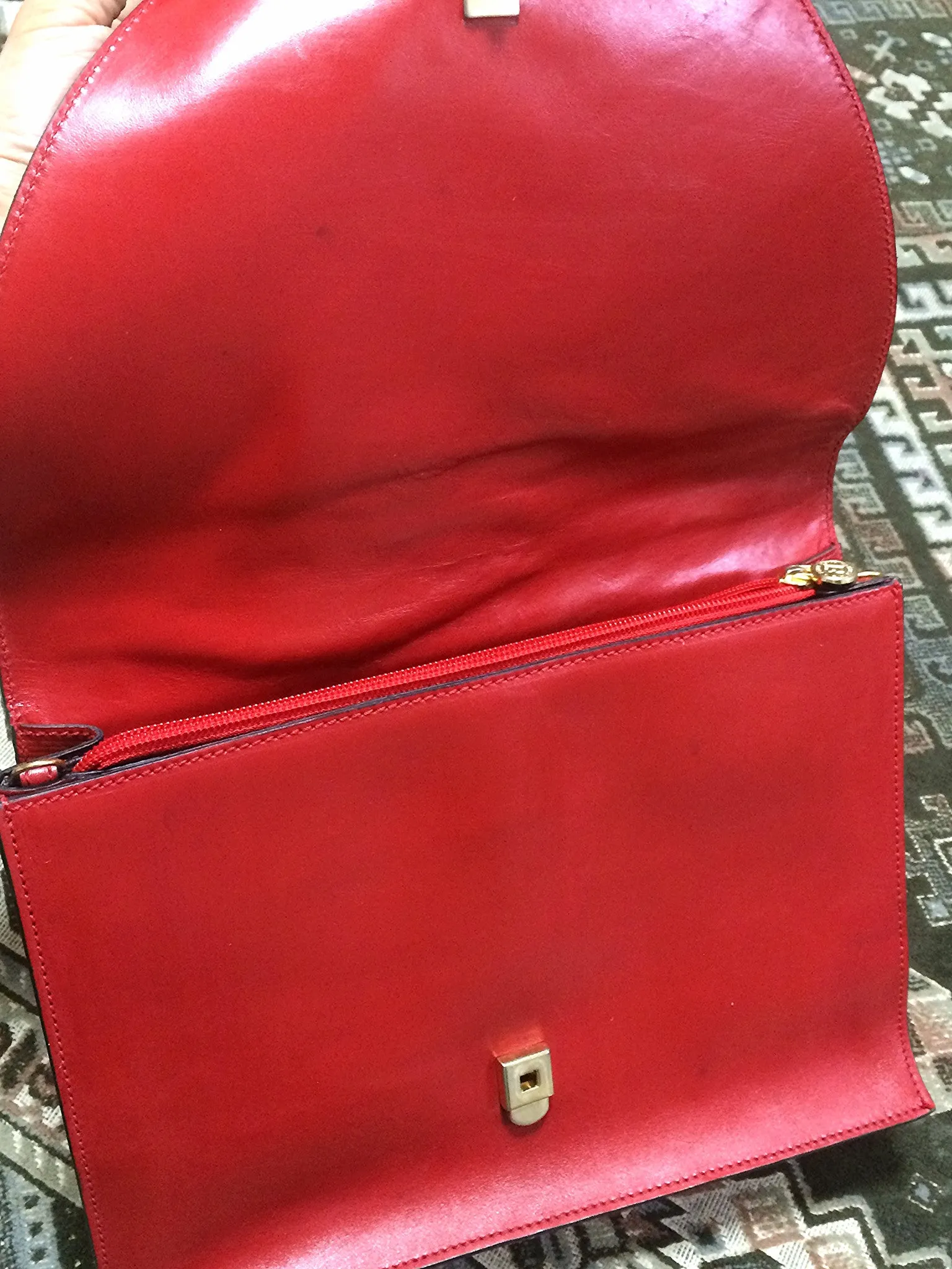 Vintage FENDI genuine red leather classic handbag with iconic Janus medallion embossed motif at front. 050628ya1