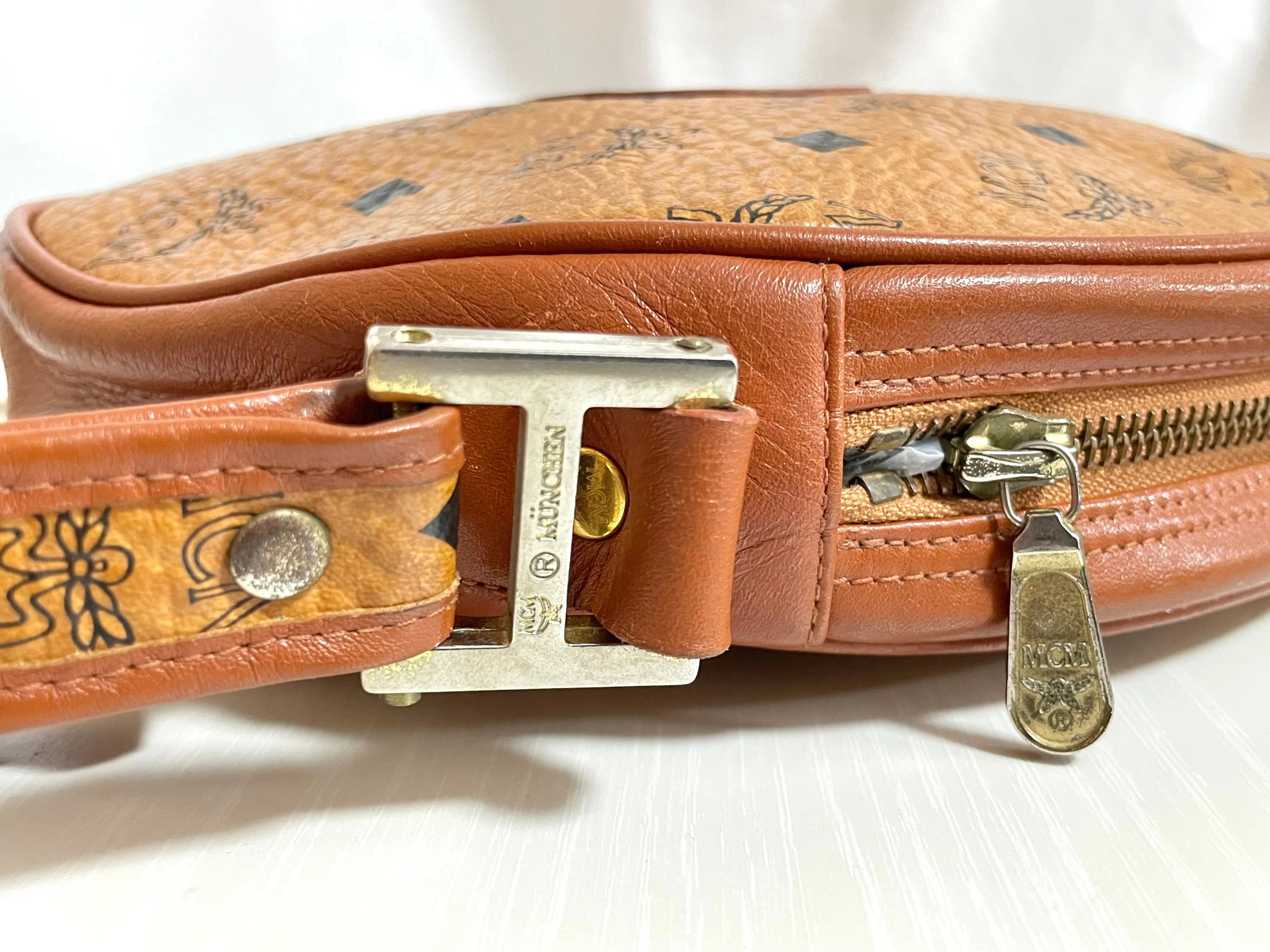Vintage MCM brown monogram round Suzy Wong shoulder bag with brown leather trimmings. Designed by Michael Cromer. Unisex. 050524ra1