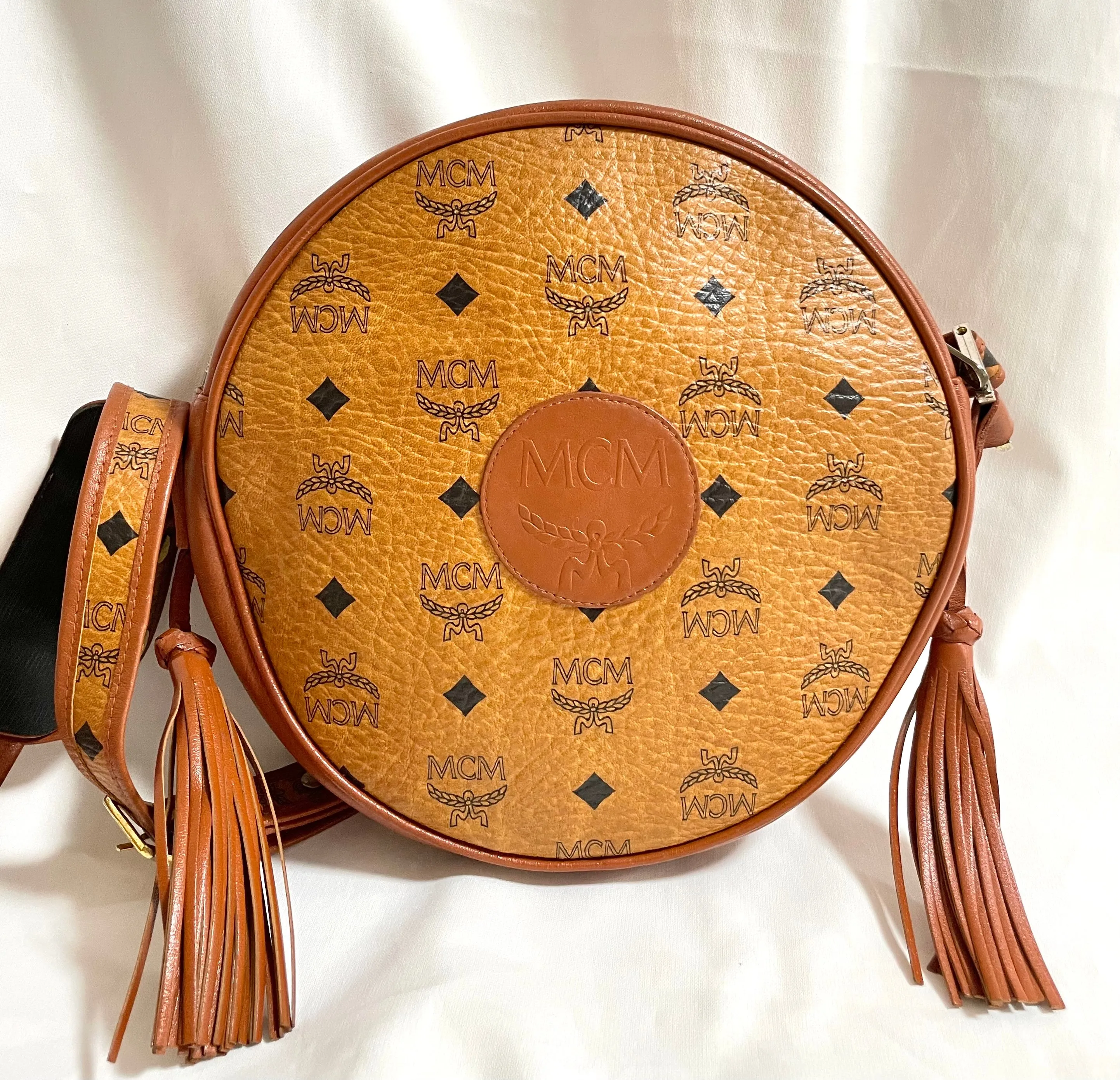 Vintage MCM brown monogram round Suzy Wong shoulder bag with brown leather trimmings. Designed by Michael Cromer. Unisex. 050524ra1