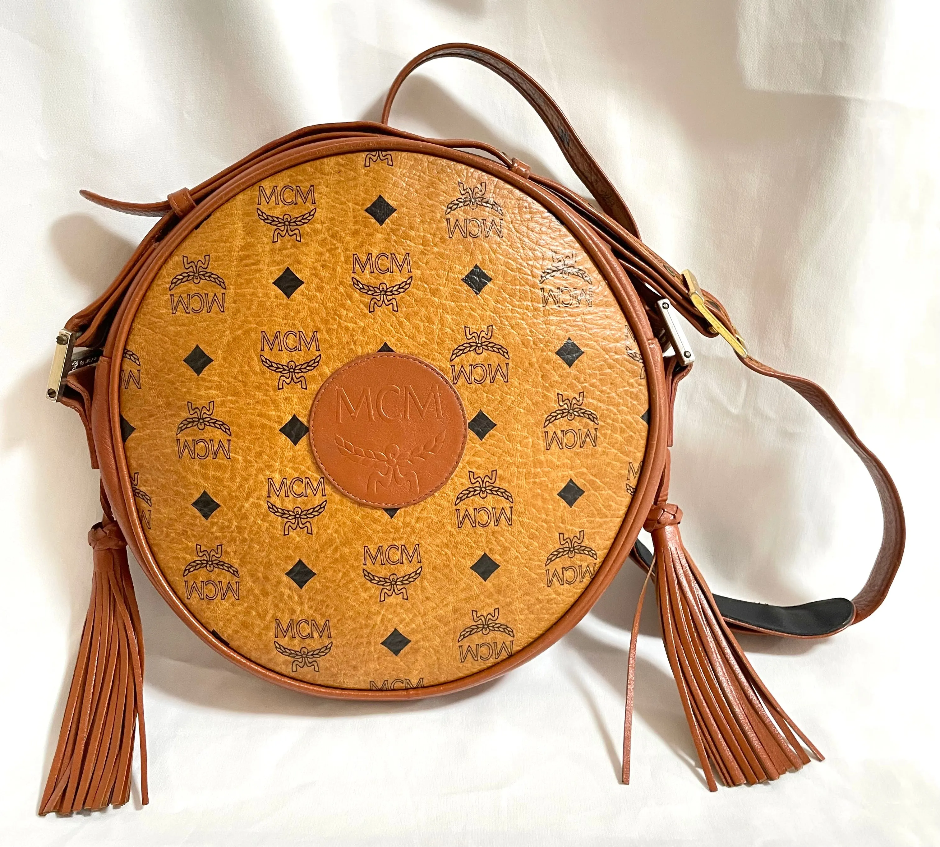 Vintage MCM brown monogram round Suzy Wong shoulder bag with brown leather trimmings. Designed by Michael Cromer. Unisex. 050524ra1