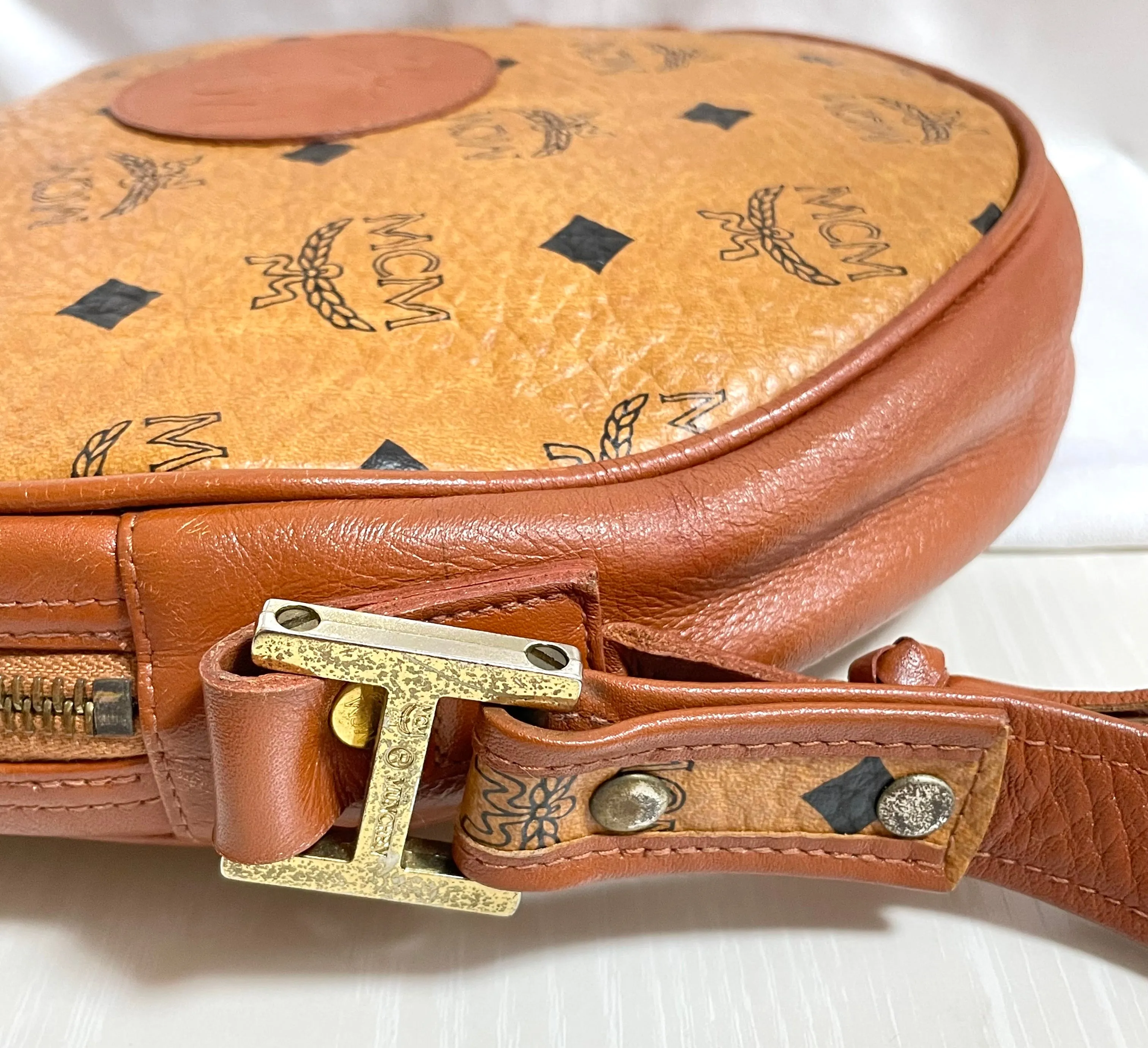 Vintage MCM brown monogram round Suzy Wong shoulder bag with brown leather trimmings. Designed by Michael Cromer. Unisex. 050524ra1