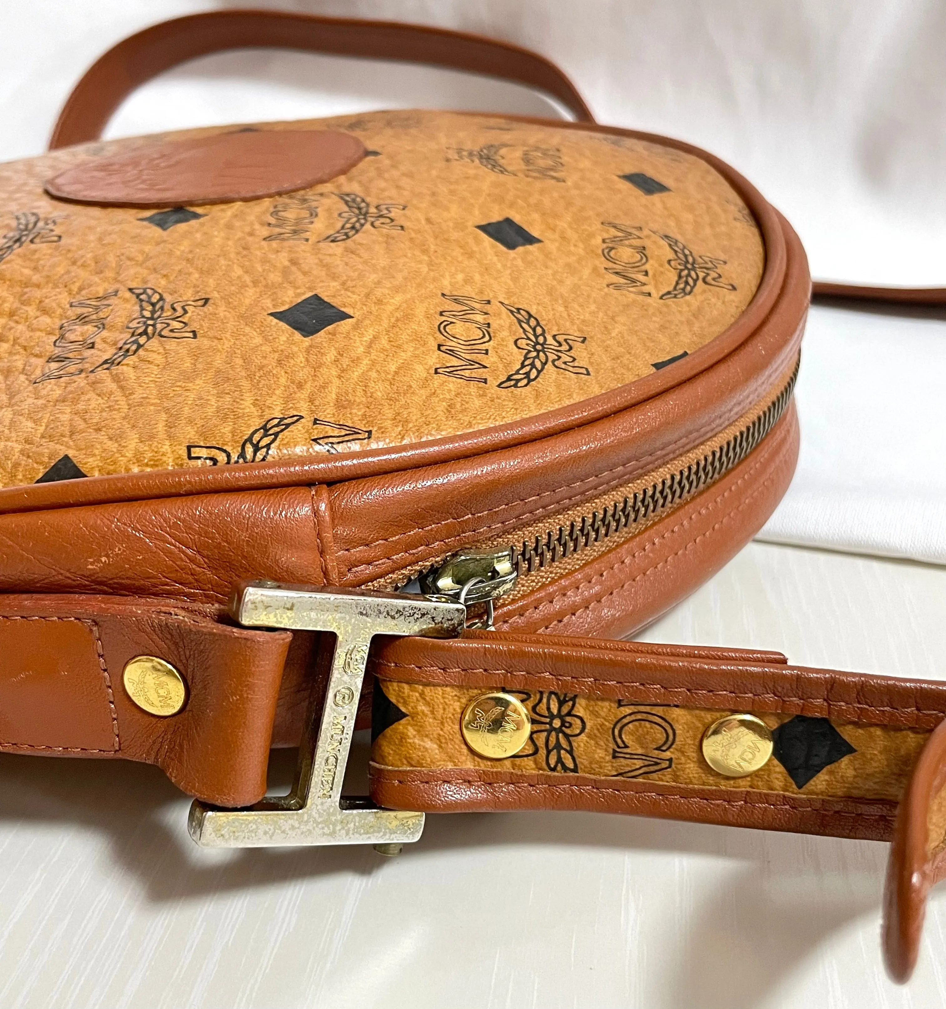Vintage MCM brown monogram round Suzy Wong shoulder bag with brown leather trimmings. Designed by Michael Cromer. Unisex. 050524ra1